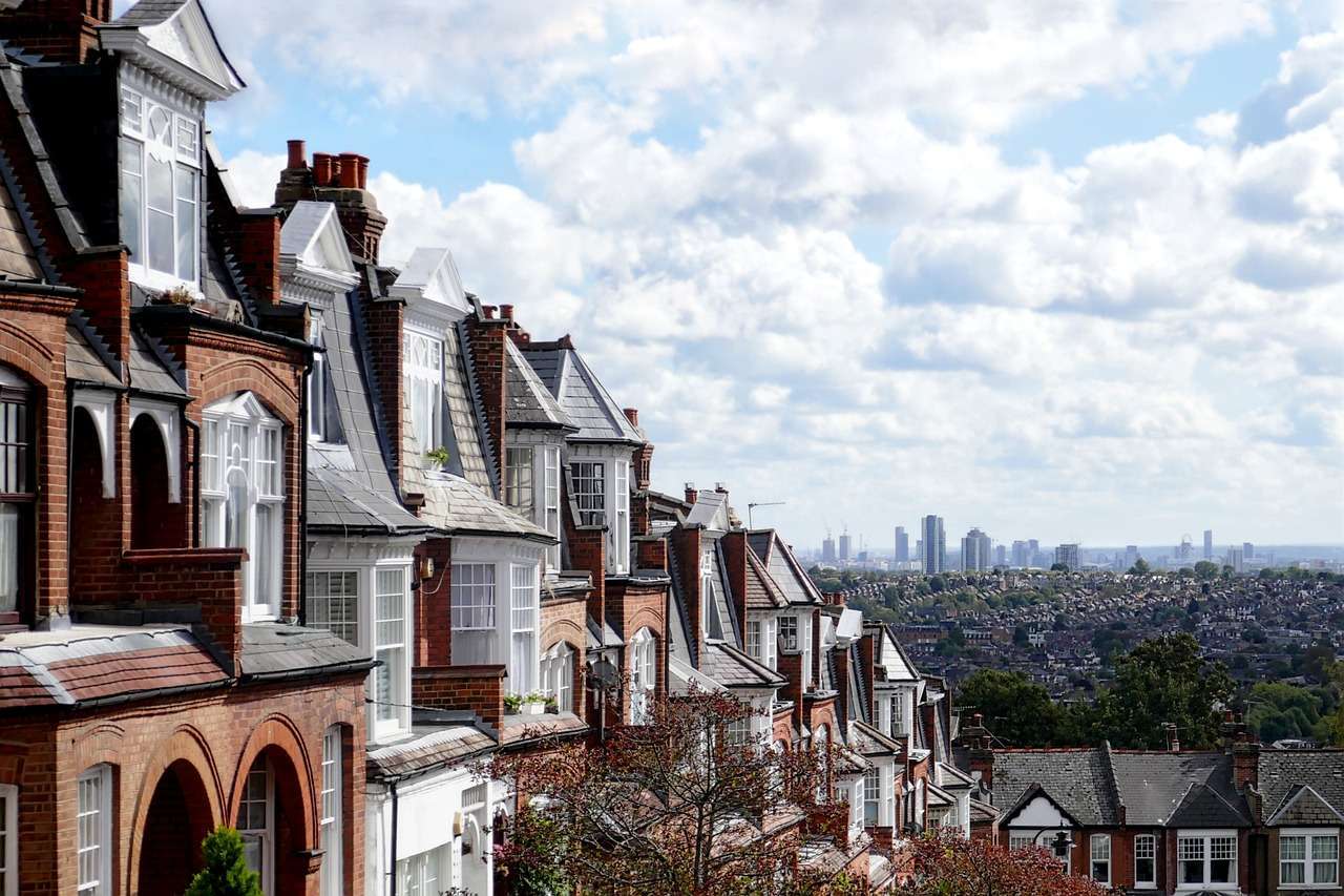 Row of suburban houses overlooking city in the distance